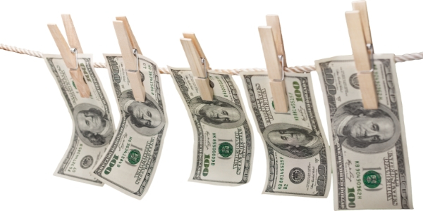 Photo of money hanging out to dry to illustrate concept of bankruptcy exemptions